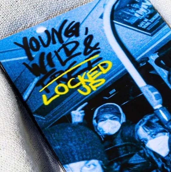 a close up of a book with graffiti on it