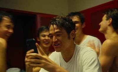 a man taking a picture of himself with his cell phone
