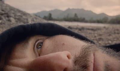 a close up of a person laying on the ground