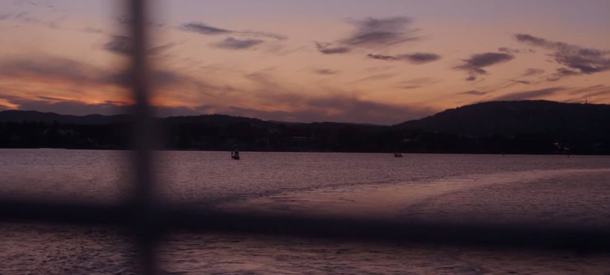 a boat traveling across a large body of water