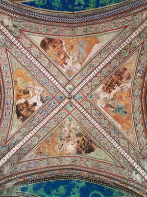 the ceiling of a building with many paintings on it