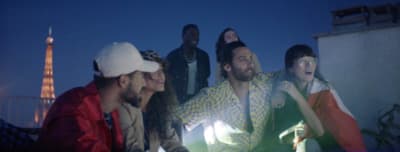 a group of people standing next to each other