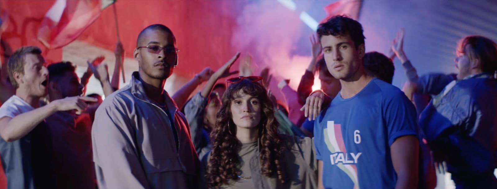 a group of people standing next to each other