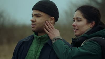 a man and a woman standing next to each other