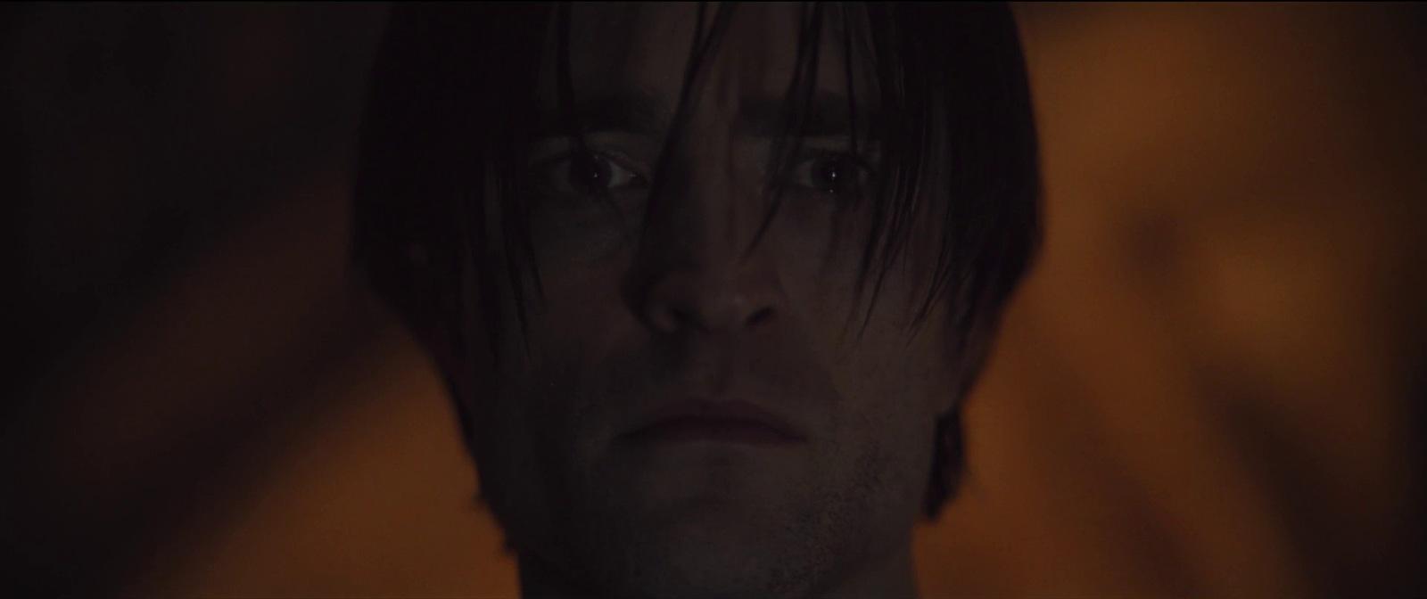 a close up of a person in a dark room