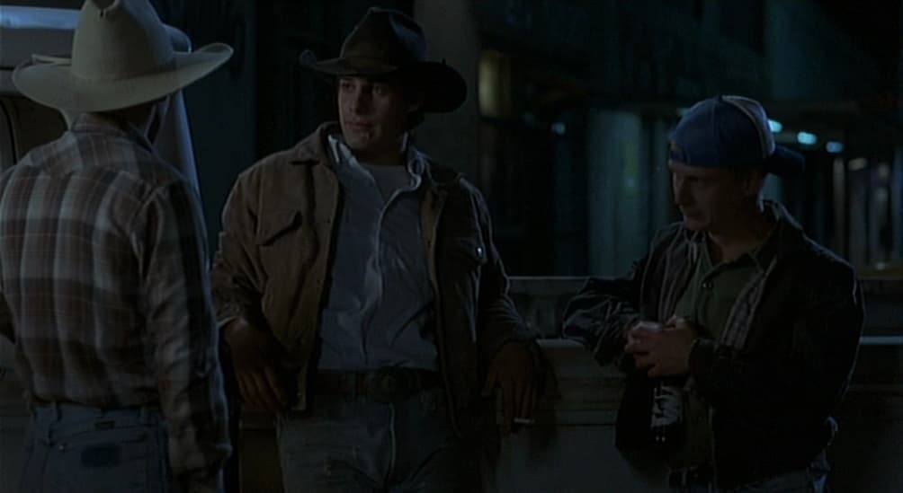 a group of men standing next to each other
