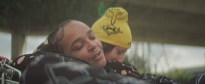 a couple of people sitting next to each other