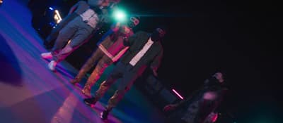 a group of young men standing next to each other
