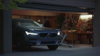 a volvo car is parked in a garage