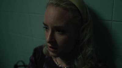 a woman with a yellow headband on her head