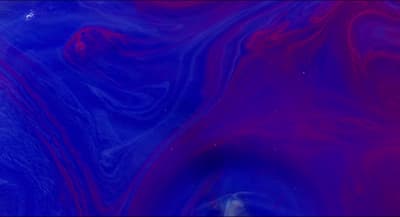 a blue and red background with swirls and bubbles