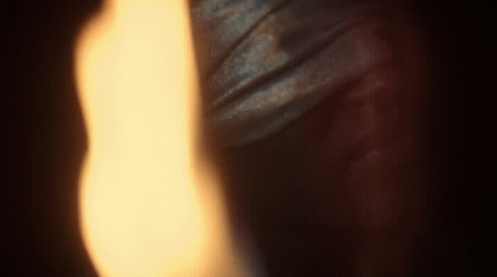 a blurry photo of a person with a tie