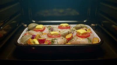 a tray of food is in the oven