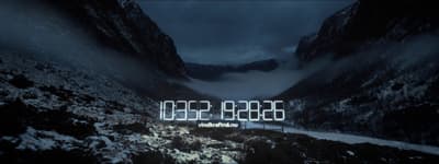 a picture of a mountain with a neon sign in the middle of it