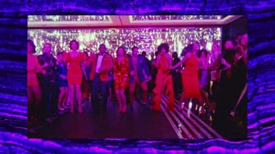 a group of people standing in a room