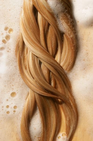 a long blonde hair laying on top of a table