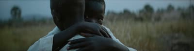 a couple of people that are hugging each other