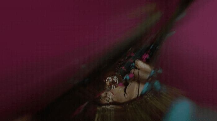a blurry photo of a woman's face and hair