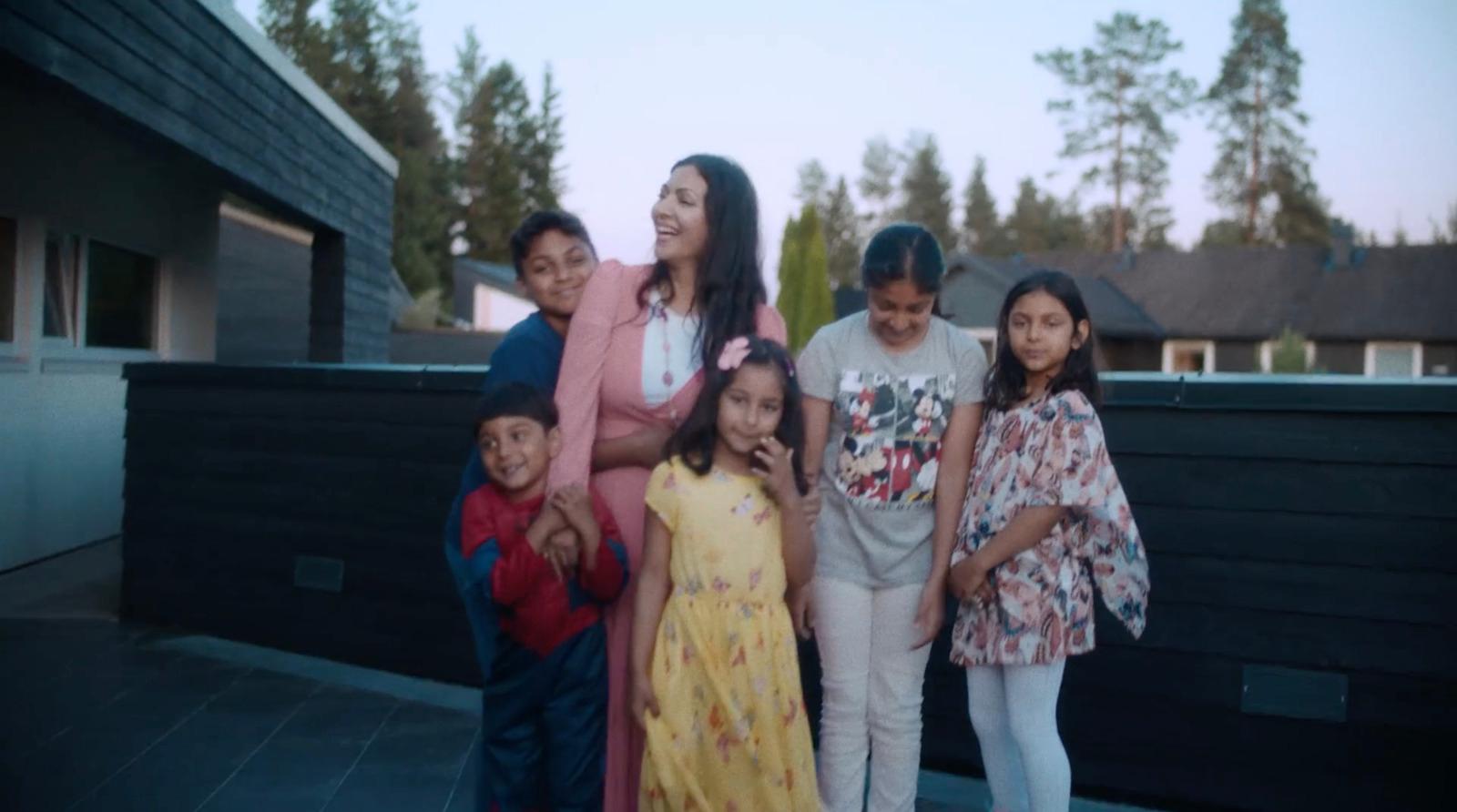 a group of children standing next to each other