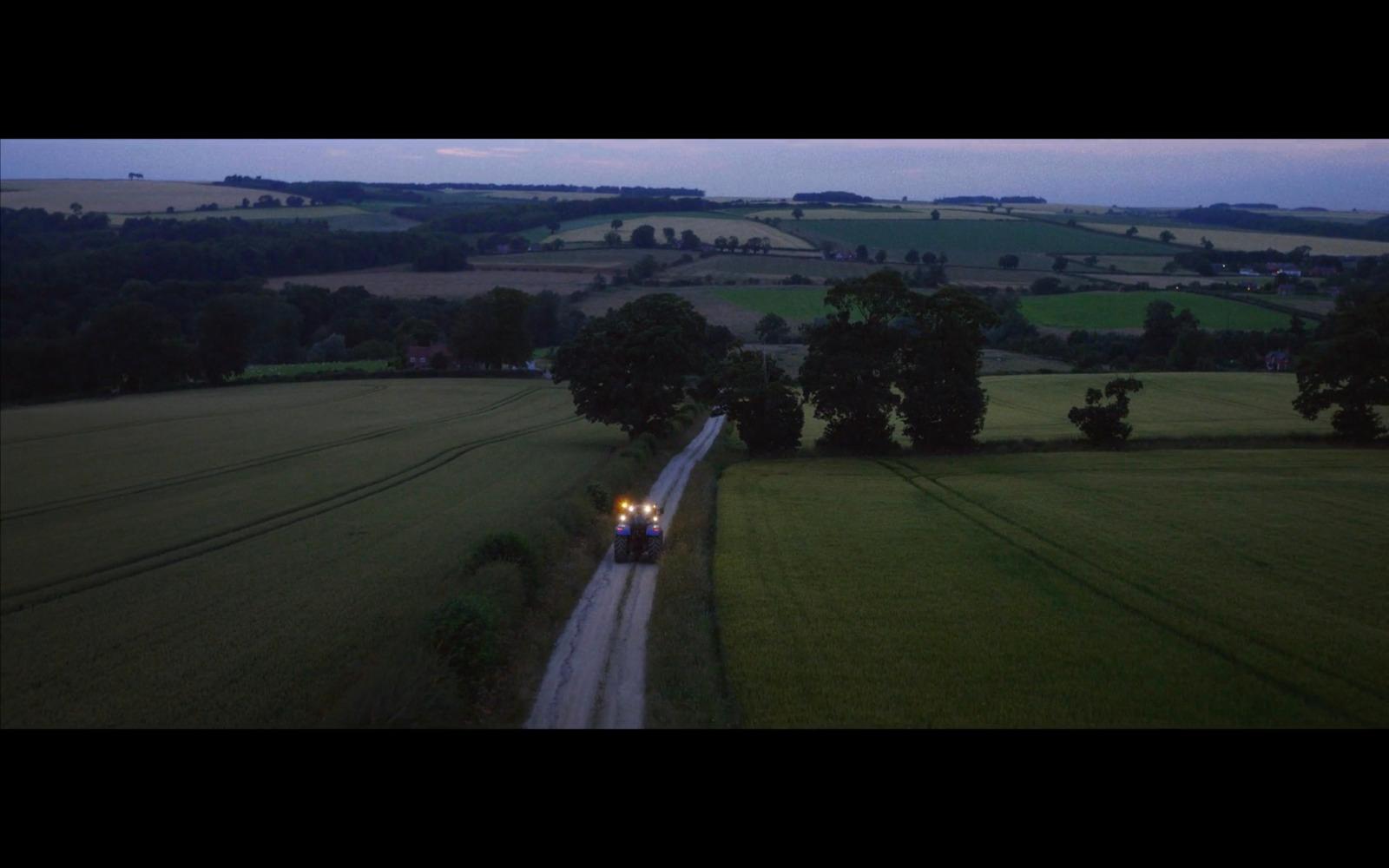 a train traveling through a lush green countryside