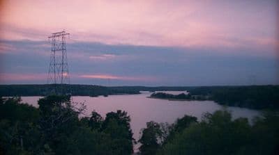 a view of a body of water from a hill