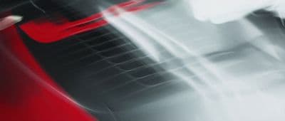 a close up of a red and black car
