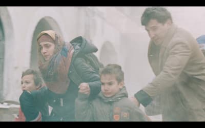a group of people standing next to each other