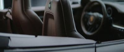 a close up of a steering wheel and dashboard of a car