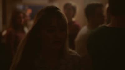 a blurry photo of a group of people in a room