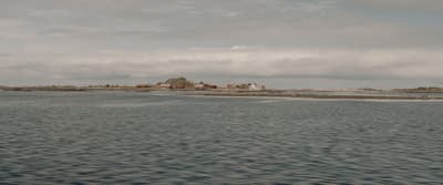 a small island in the middle of a body of water