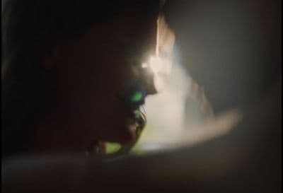 a man and a woman looking at each other