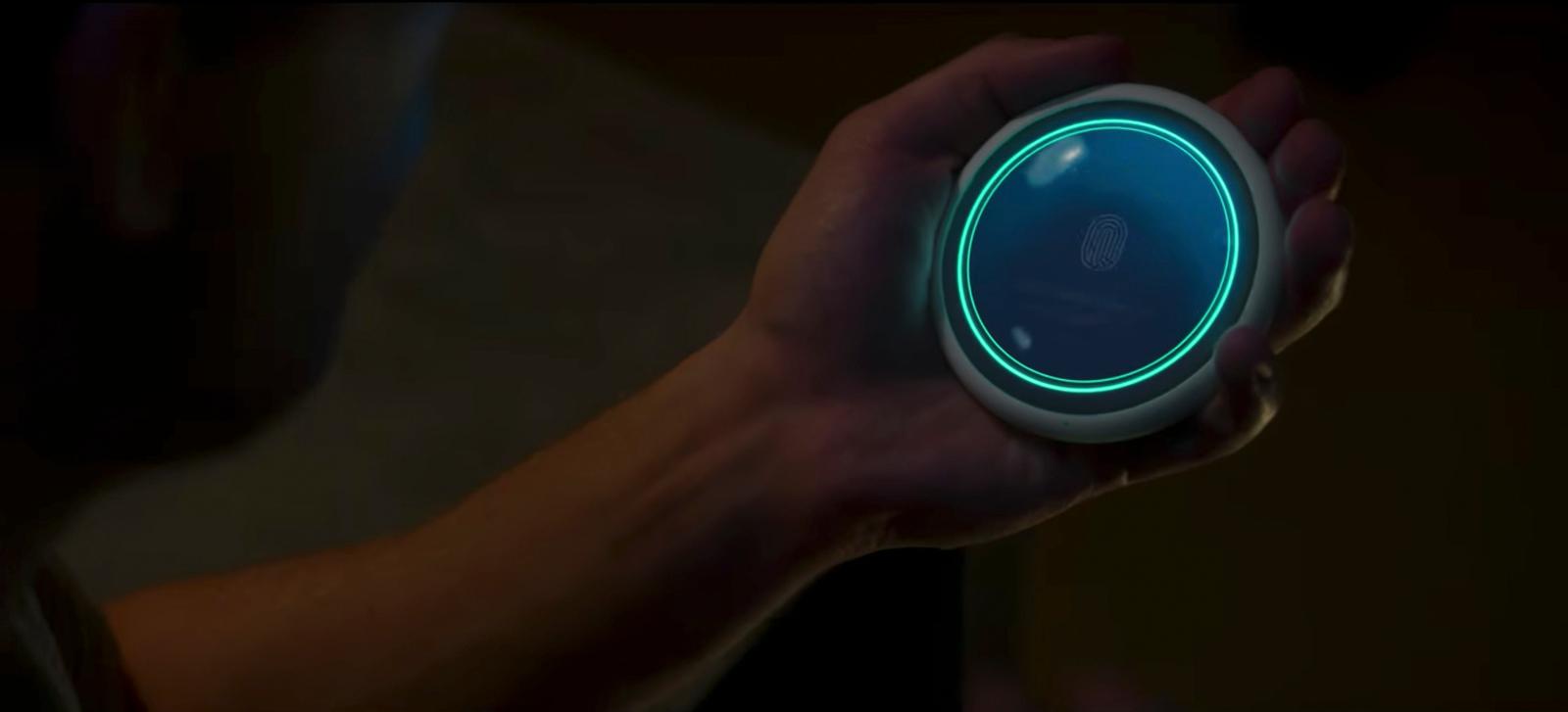 a person holding a glowing object in their hand