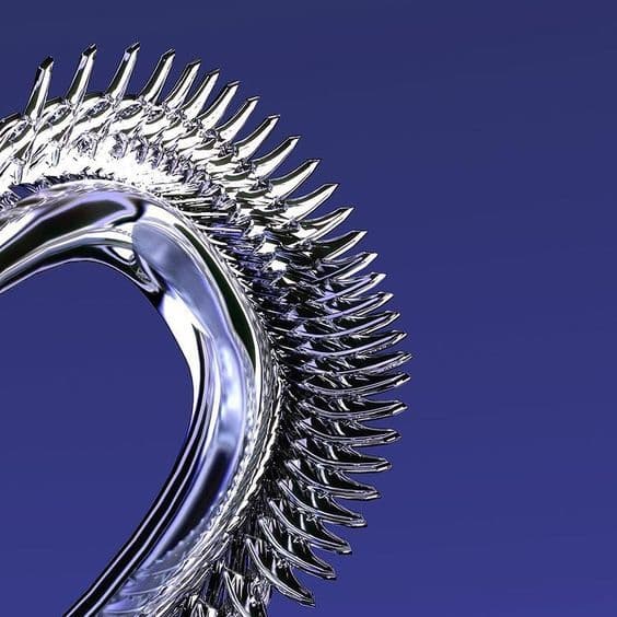 a close up of a metal object on a blue background