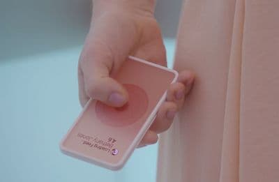 a person holding a card in their hand