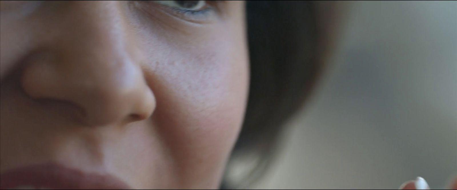 a close up of a person holding a cell phone