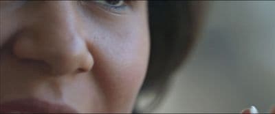 a close up of a person holding a cell phone