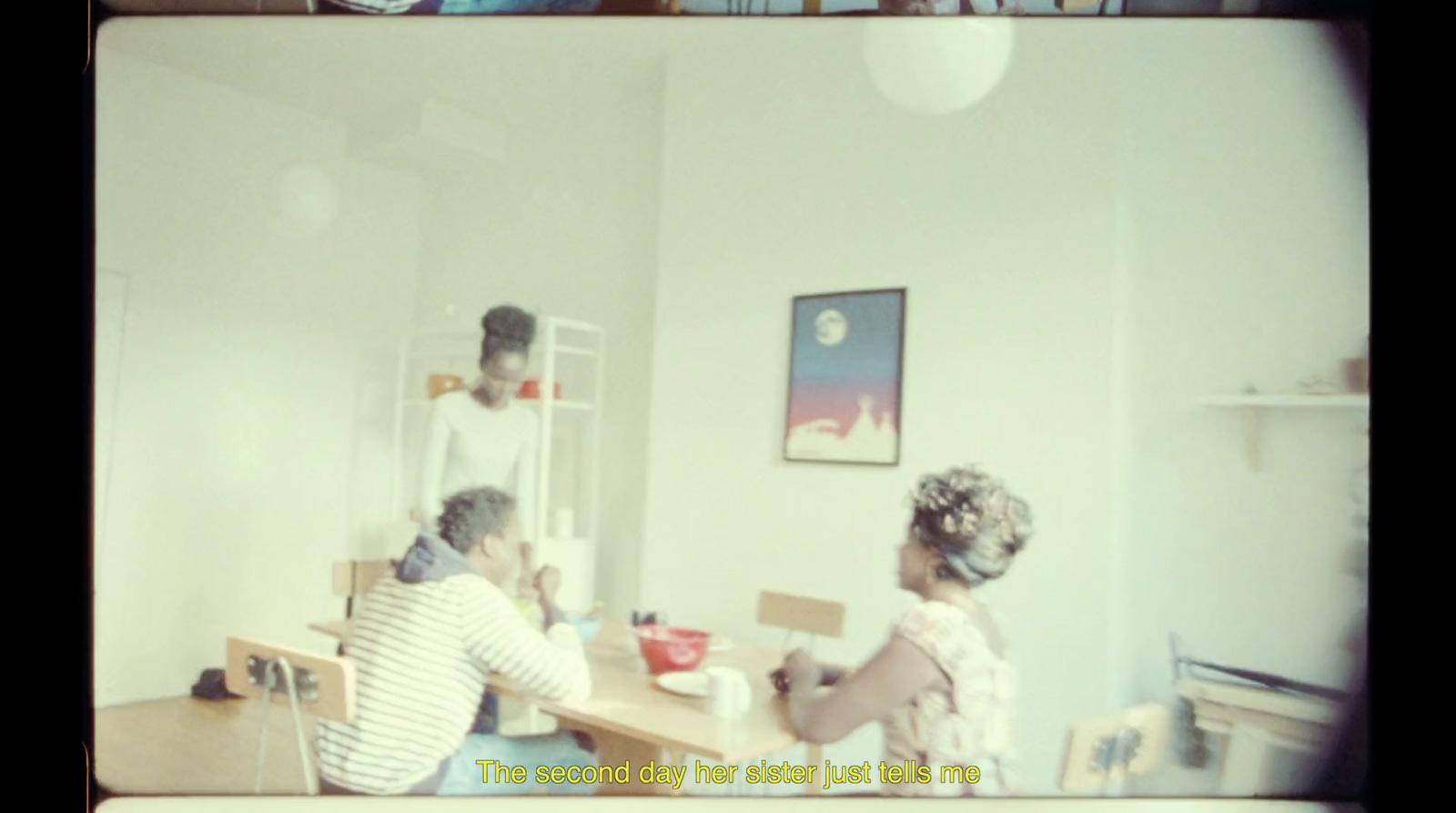 a man and a woman sitting at a table