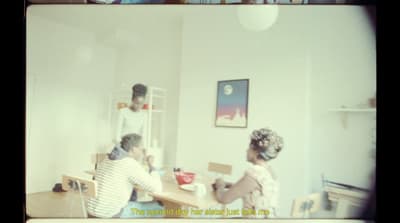 a man and a woman sitting at a table