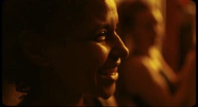 a close up of a person with a smile on their face