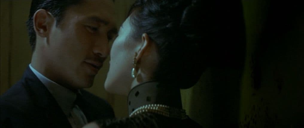a man and a woman standing next to each other