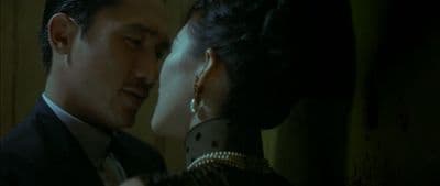 a man and a woman standing next to each other
