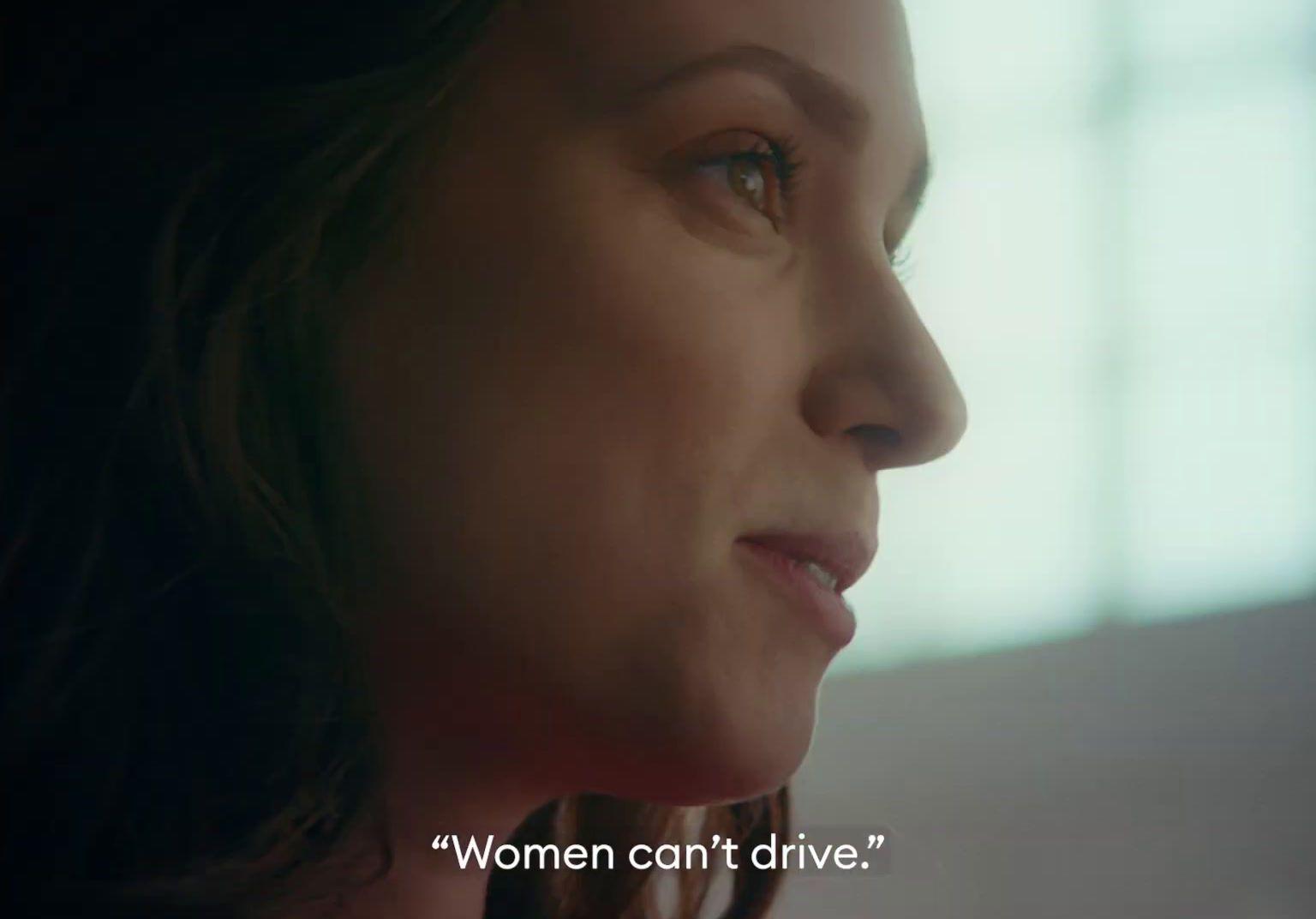 a close up of a woman's face with the words women can't
