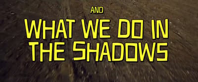 the words what we do in the shadows are yellow