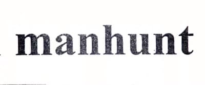 a close up of the word manhunt on a white background