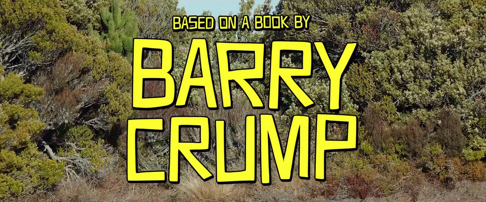 a sign that says barry crump in front of a forest