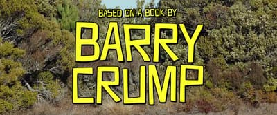 a sign that says barry crump in front of a forest