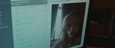 a computer screen with a picture of a woman on it