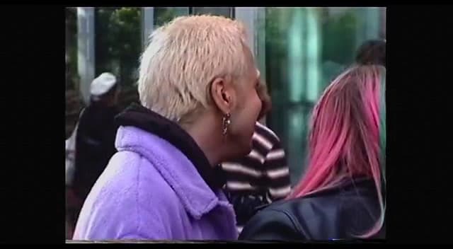 a couple of women standing next to each other