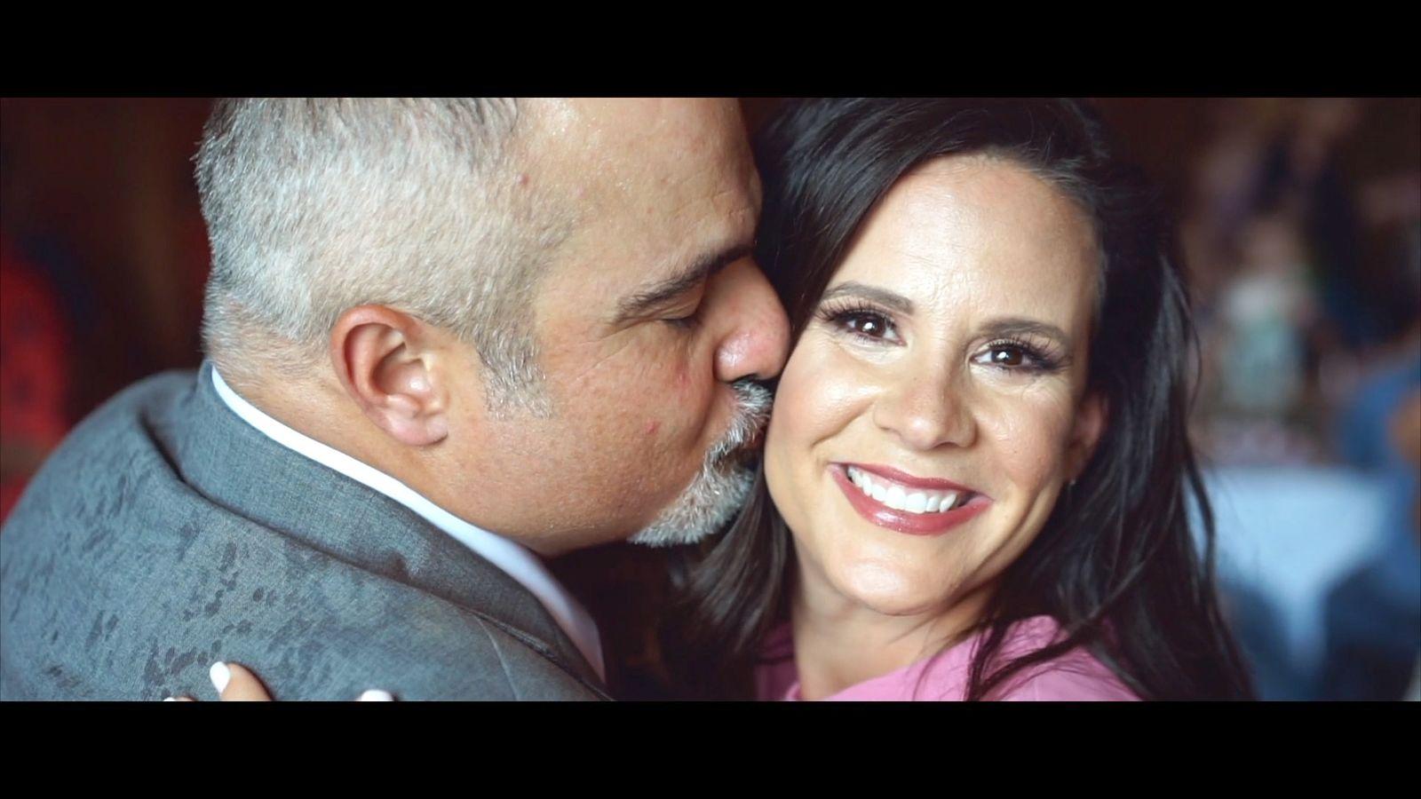 a man and a woman embracing each other
