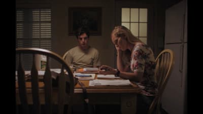 a man and a woman sitting at a table